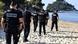 French Gendarmes patrol the beach in Biarritz