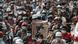 People attend the funeral of Angel a 19-year-old protester also known as Kyal Sin who was shot in the head as Myanmar forces opened fire to disperse an anti-coup demonstration in Mandalay, Myanmar, March 4, 2021.